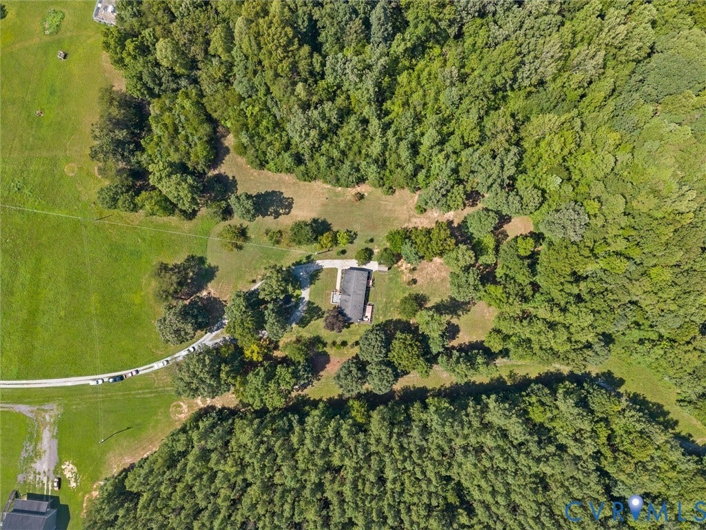 4554 Powhatan Lakes Road, Powhatan, VA 23139 Aerial view showcasing a rural property nestled within mature woodland