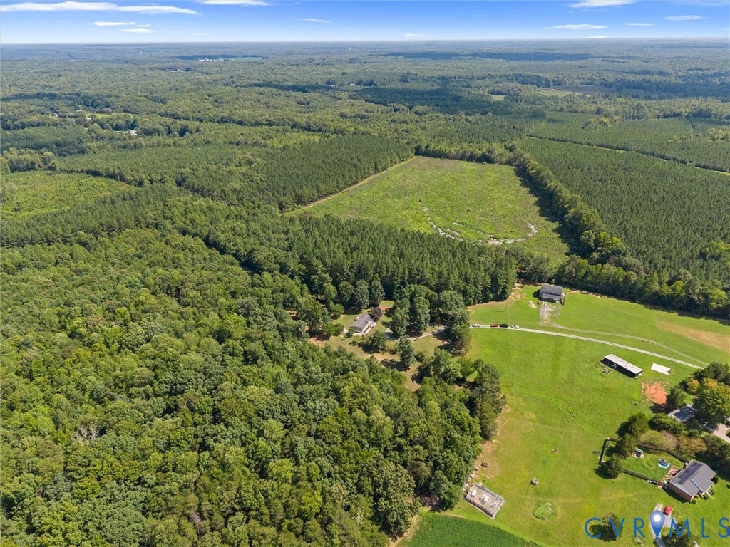 4554 Powhatan Lakes Road, Powhatan, VA 23139 Expansive wooded acreage featuring cleared land and multiple structures
