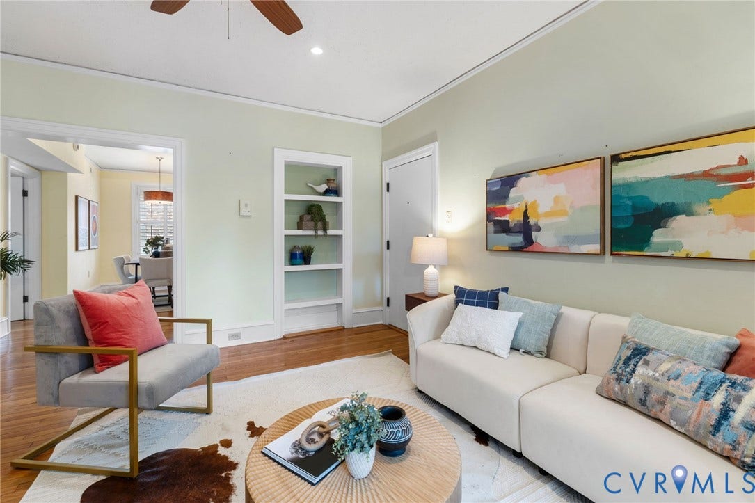 Hardwood flooring throughout, recessed lighting, ceiling fan, and built-in shelving