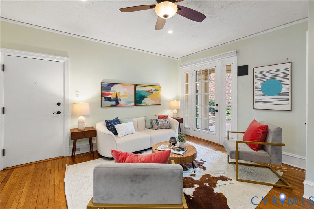 Hardwood flooring, crown molding, double French doors, and ceiling fan with integrated lighting