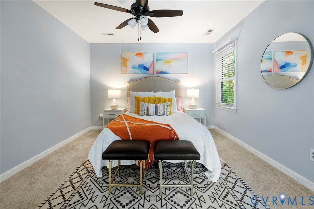2308 Strangford Court, Henrico, VA 23233 Carpeted flooring, window with blinds, ceiling fan with integrated lighting, and light blue wall tones