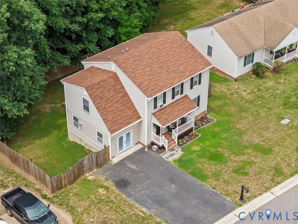 6712 N Hedges Road, Chesterfield, VA 23224 Two-story property featuring light-colored siding and a brown shingle roof
