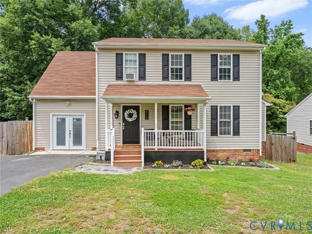 6712 N Hedges Road, Chesterfield, VA 23224 Two-story residence featuring light-colored siding and a brown shingle roof