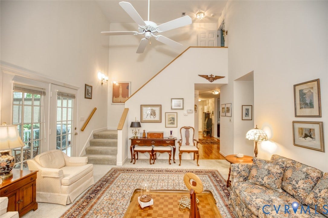 6311 Chiswick Park, Williamsburg, VA 23188 Soaring two-story foyer with ceiling fan and recessed lighting anchors this open-concept living space