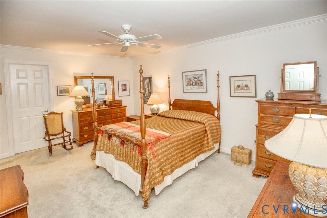 6311 Chiswick Park, Williamsburg, VA 23188 Wall-to-wall carpeting and white walls with crown molding