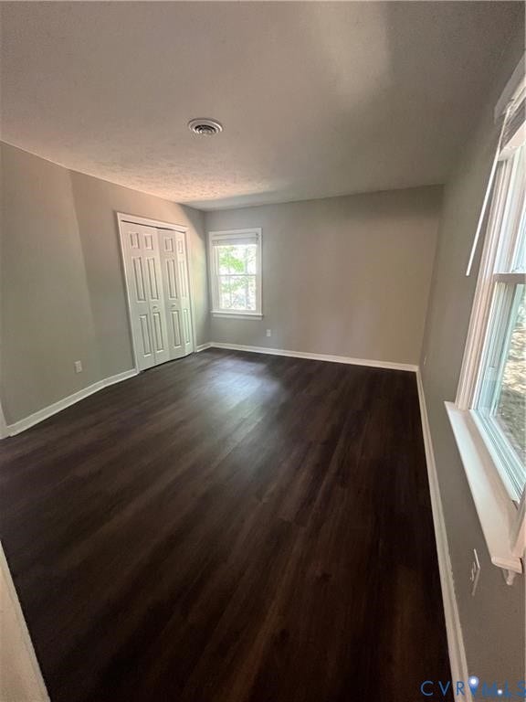 7032 Claybird Lane, Mechanicsville, VA 23111 Expansive flooring with a dark wood finish and white trim