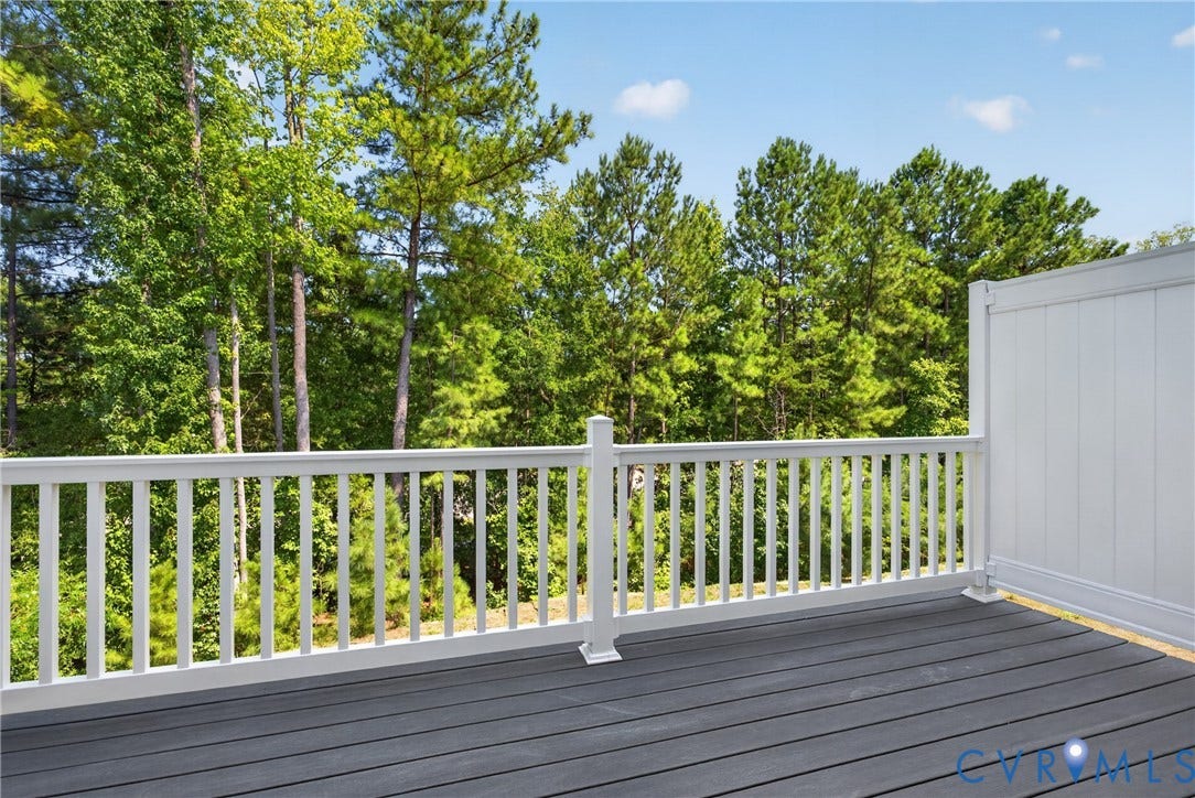 6537 Hardee Haven Place, Midlothian, VA 23112 Deck featuring composite planking, white railing, and a privacy wall