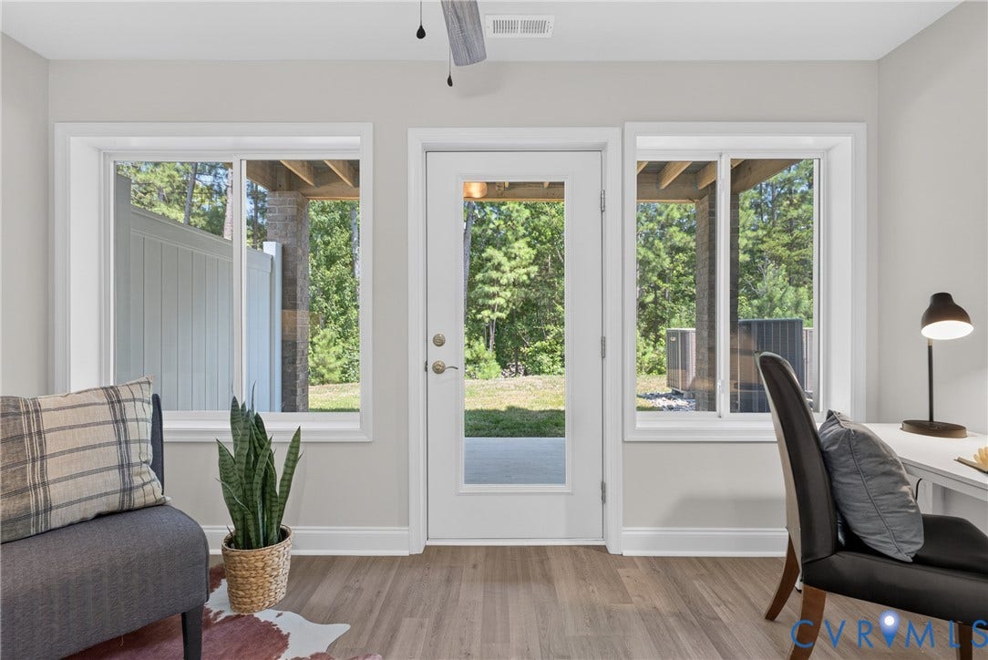6537 Hardee Haven Place, Midlothian, VA 23112 Wood-finish flooring, white trim, and a glass-paneled door