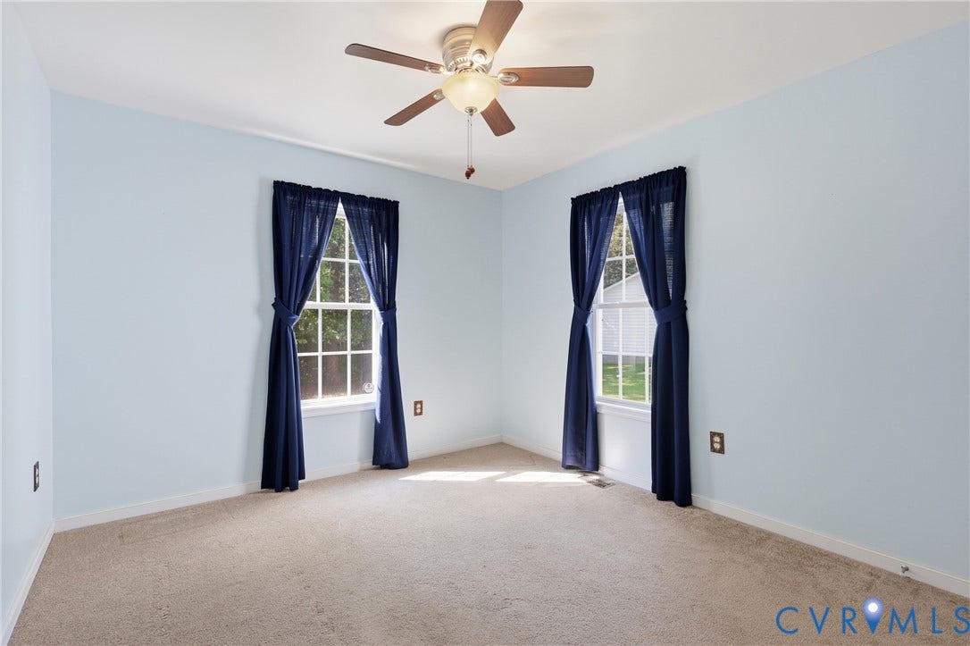 5295 Chimney Springs Drive, Saunders Acres, Goochland, VA 23063 White walls with gray carpet flooring, a ceiling fan with integrated lighting, and two open closet spaces with shelving