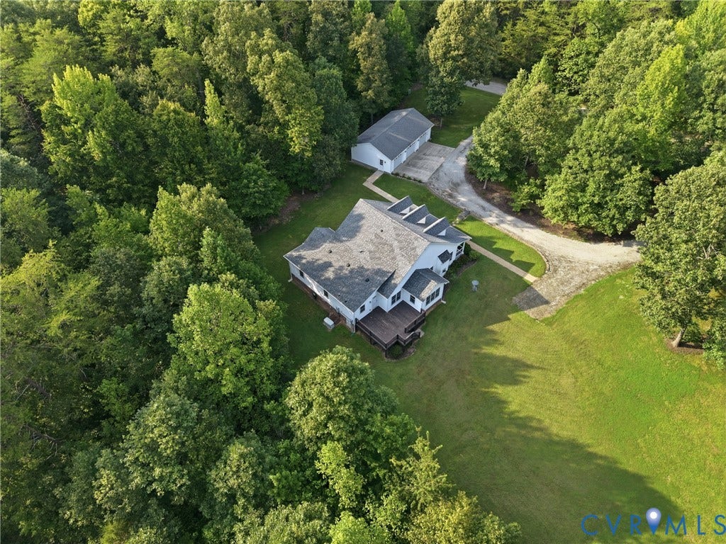 5295 Chimney Springs Drive, Saunders Acres, Goochland, VA 23063 Aerial view showcasing a substantial two-story residence set on expansive grounds surrounded by mature tree coverage