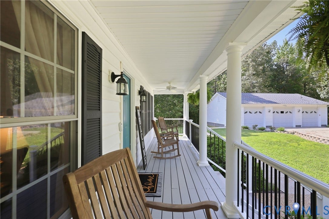 5295 Chimney Springs Drive, Saunders Acres, Goochland, VA 23063 Country front porch with white columns, black railings, and light blue door