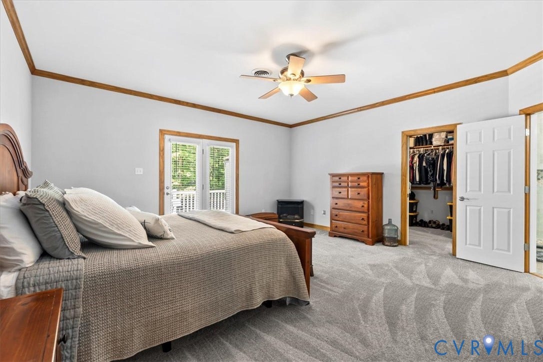 3060 Moyer Road, Powhatan, VA 23139 White walls with wood trim and matching wood-finish doors