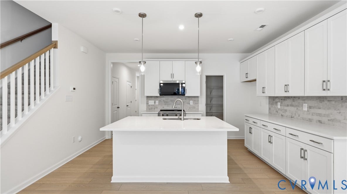 4312 Aurora Drive, The Townes At Mount Hermon, Moseley, VA 23120 This home is MOVE-IN READY! The photo represents the actual home.