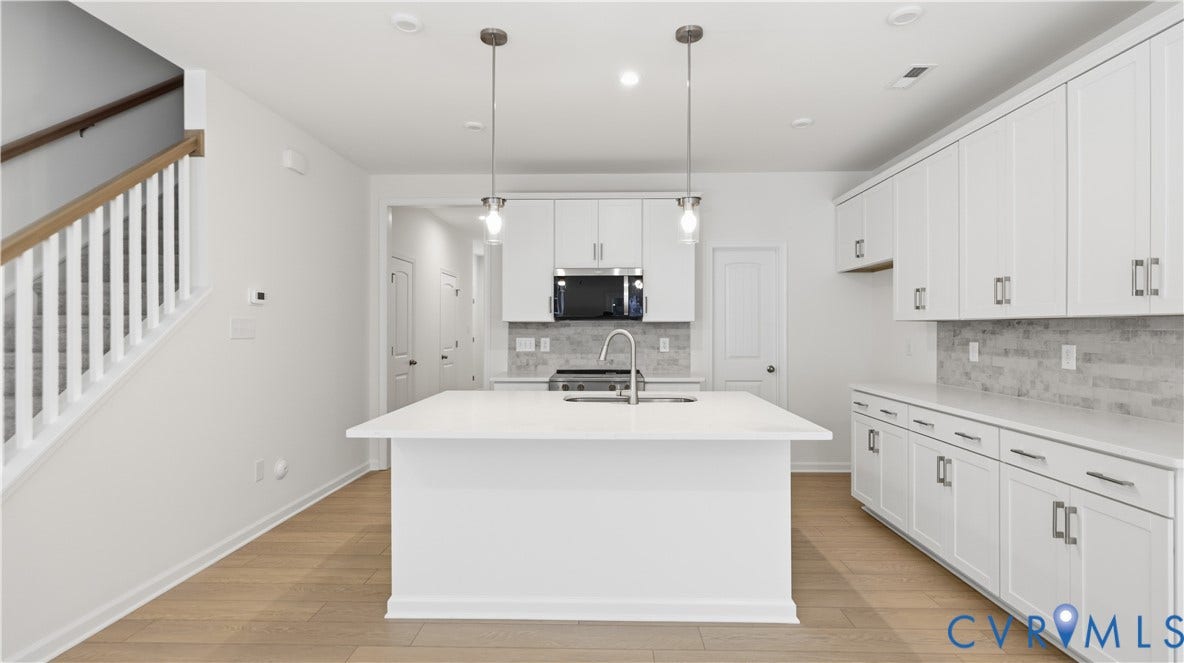 4312 Aurora Drive, The Townes At Mount Hermon, Moseley, VA 23120 This home is MOVE-IN READY! The photo represents the actual home.