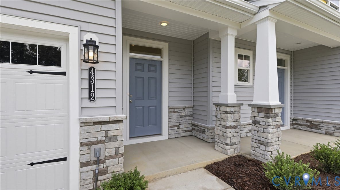 4312 Aurora Drive, The Townes At Mount Hermon, Moseley, VA 23120 This home is MOVE-IN READY! The photo represents the actual home.