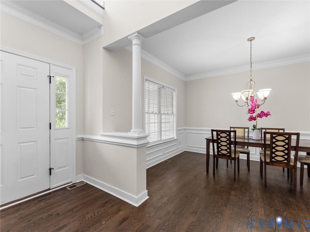 5017 Sadler Glen Place, Glen Allen, VA 23060 Wood-finish flooring throughout, complemented by crisp white baseboards and crown molding