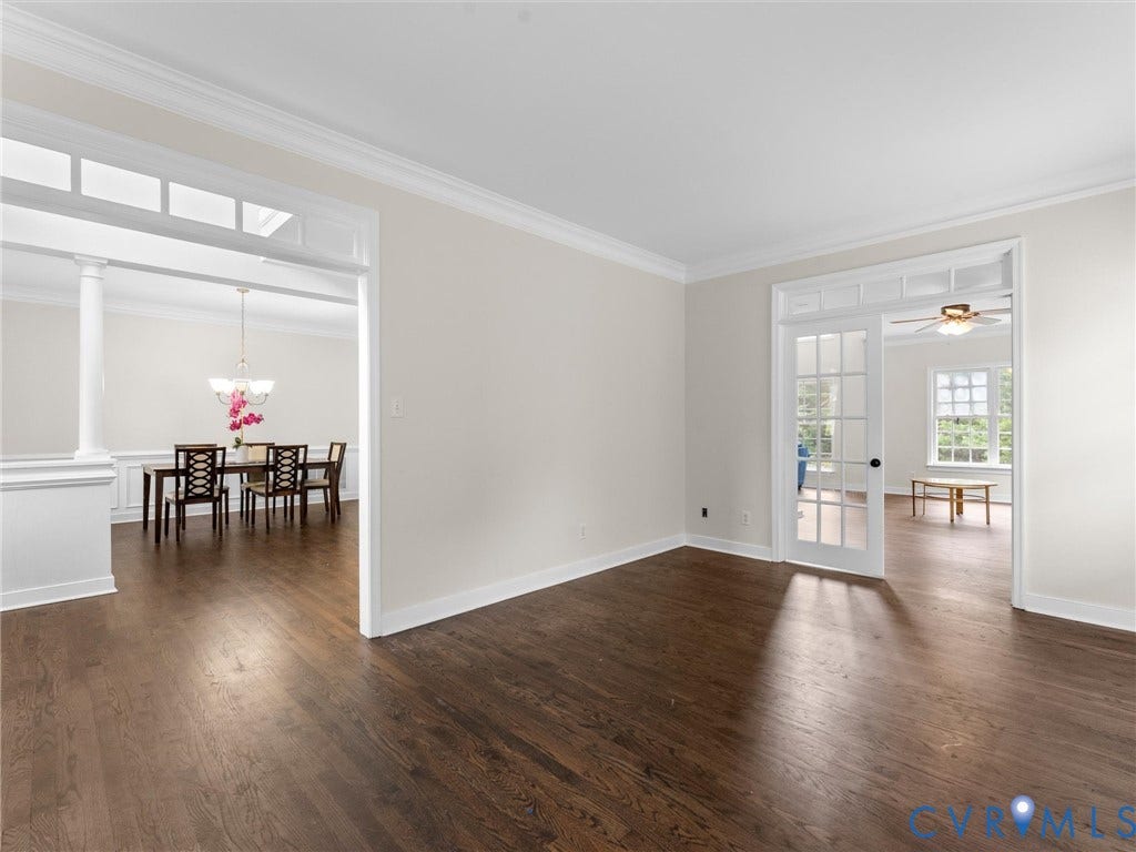 5017 Sadler Glen Place, Glen Allen, VA 23060 Rich wood-finish flooring throughout, crown molding, and wainscoting