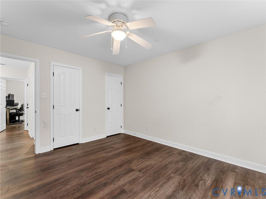 5017 Sadler Glen Place, Glen Allen, VA 23060 Wood-finish flooring, overhead ceiling fan with light, white interior doors, and neutral wall paint