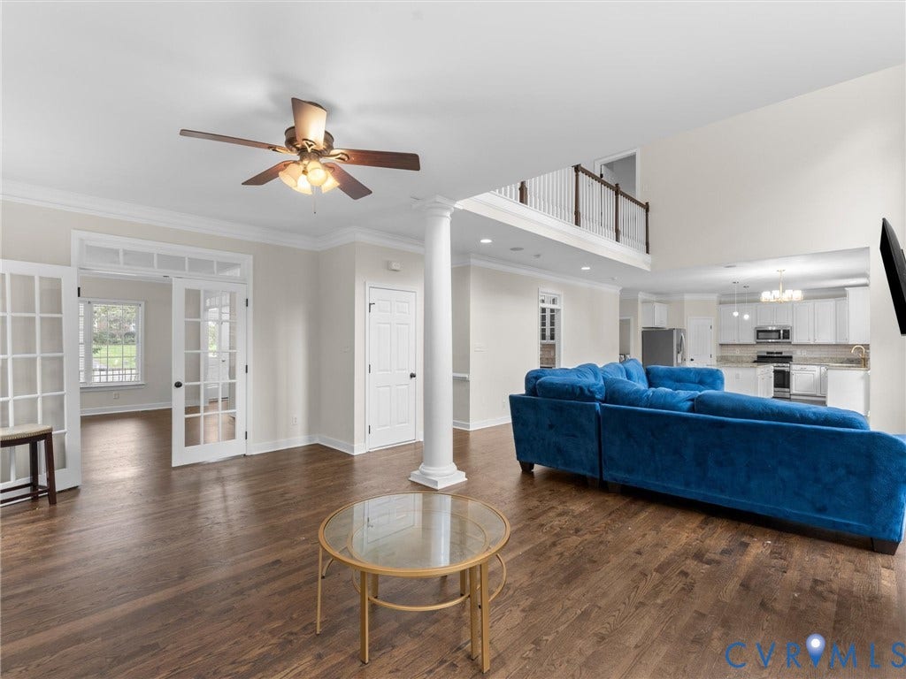 5017 Sadler Glen Place, Glen Allen, VA 23060 Hardwood flooring, high ceilings, open concept design, white French doors, and a decorative column