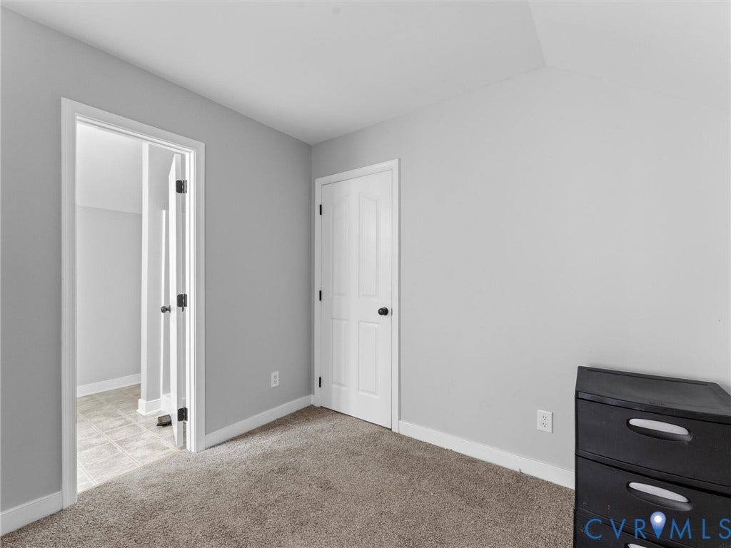 5017 Sadler Glen Place, Glen Allen, VA 23060 Neutral painted walls with carpet flooring