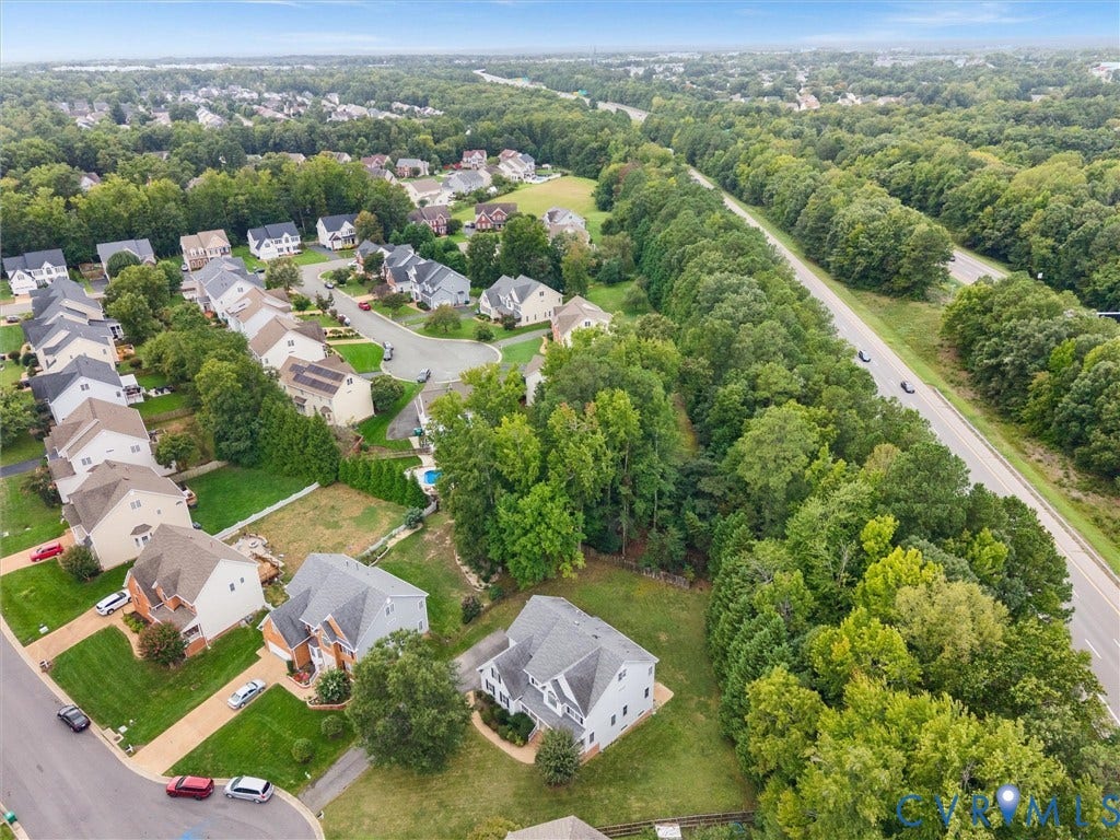 5017 Sadler Glen Place, Glen Allen, VA 23060 Residential neighborhood with mature trees, established homes, and an adjacent multi-lane road
