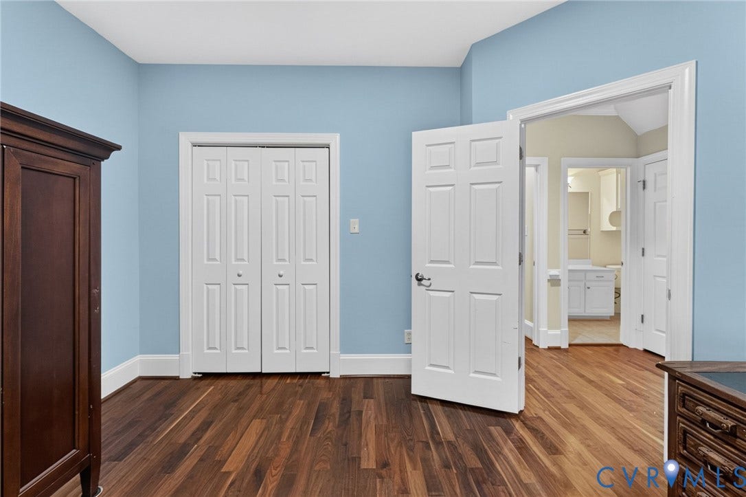 Wood-finish flooring with light blue wall paint