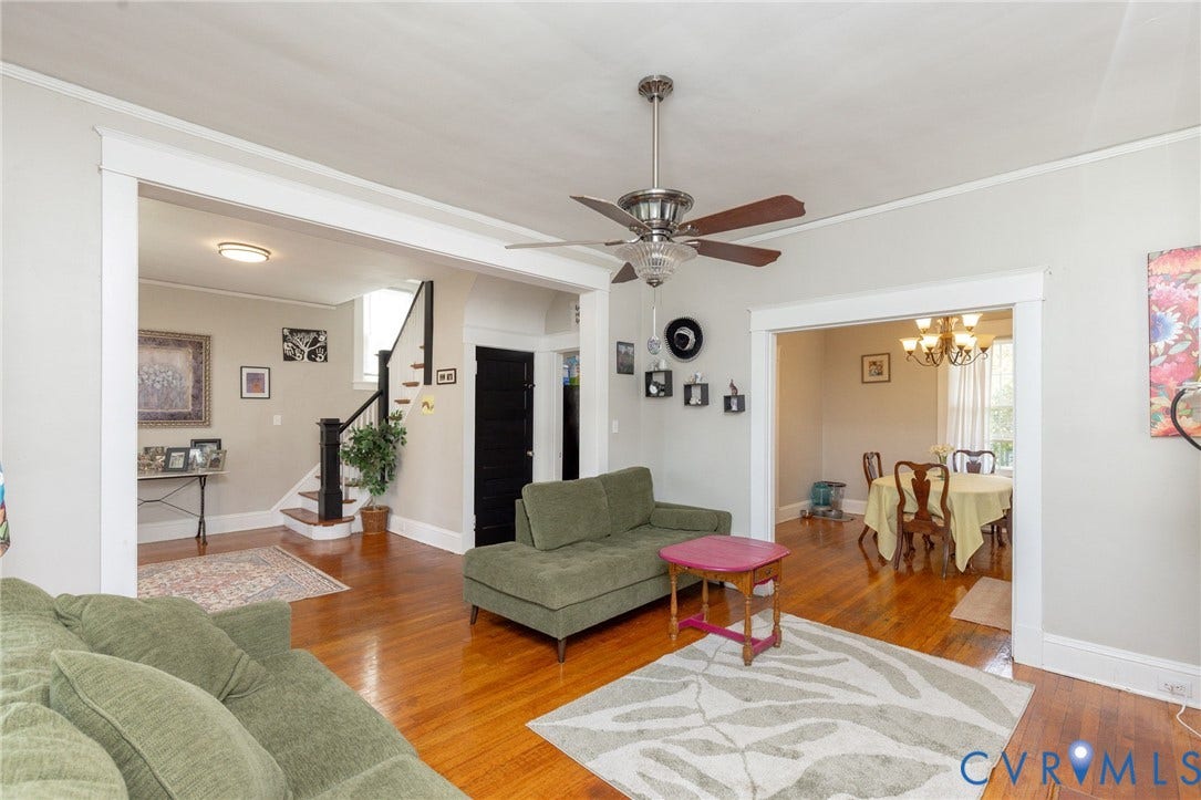 2726 Hanes Avenue, Brookland Park, Richmond, VA 23222 Hardwood flooring, recessed lighting, ceiling fan, white trim, and a staircase with dark wood railings