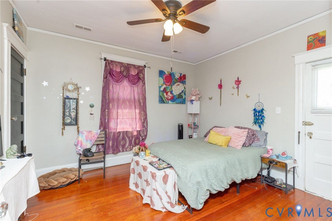2726 Hanes Avenue, Brookland Park, Richmond, VA 23222 Wood-finish flooring, ceiling fan with light fixture, white trim work, and a window with blinds