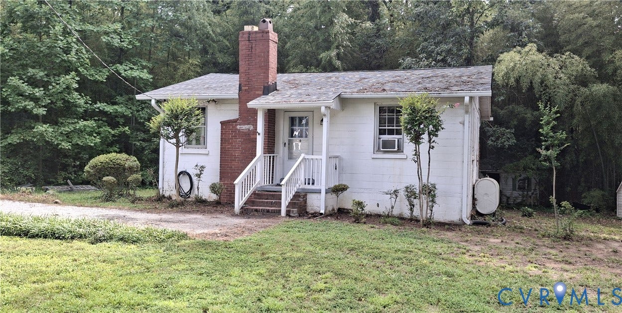 7107 Old Westham Road, Stratford Hills, Richmond, VA 23225 White exterior with a brick chimney and white railing