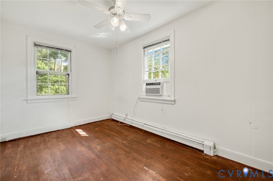 7107 Old Westham Road, Stratford Hills, Richmond, VA 23225 Wood-finish flooring, white walls, and a ceiling fan