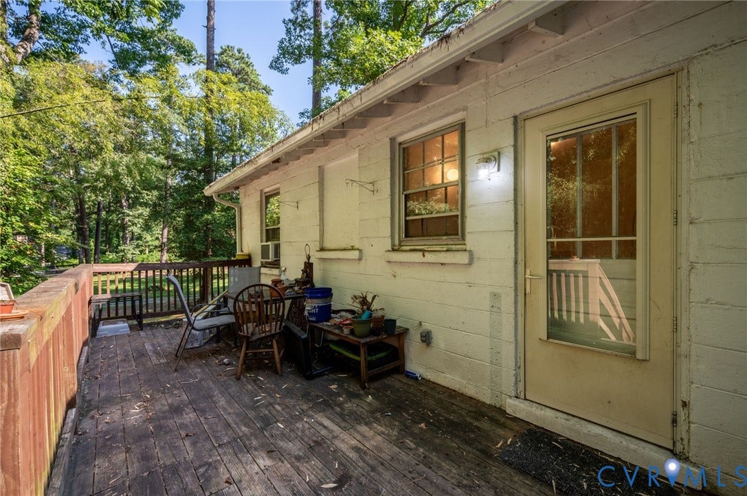 7107 Old Westham Road, Stratford Hills, Richmond, VA 23225 Wood deck with a railing and surrounded by mature trees