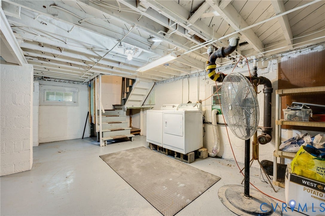 7107 Old Westham Road, Stratford Hills, Richmond, VA 23225 Utility space with painted concrete flooring, exposed ceiling joists, and a built-in staircase