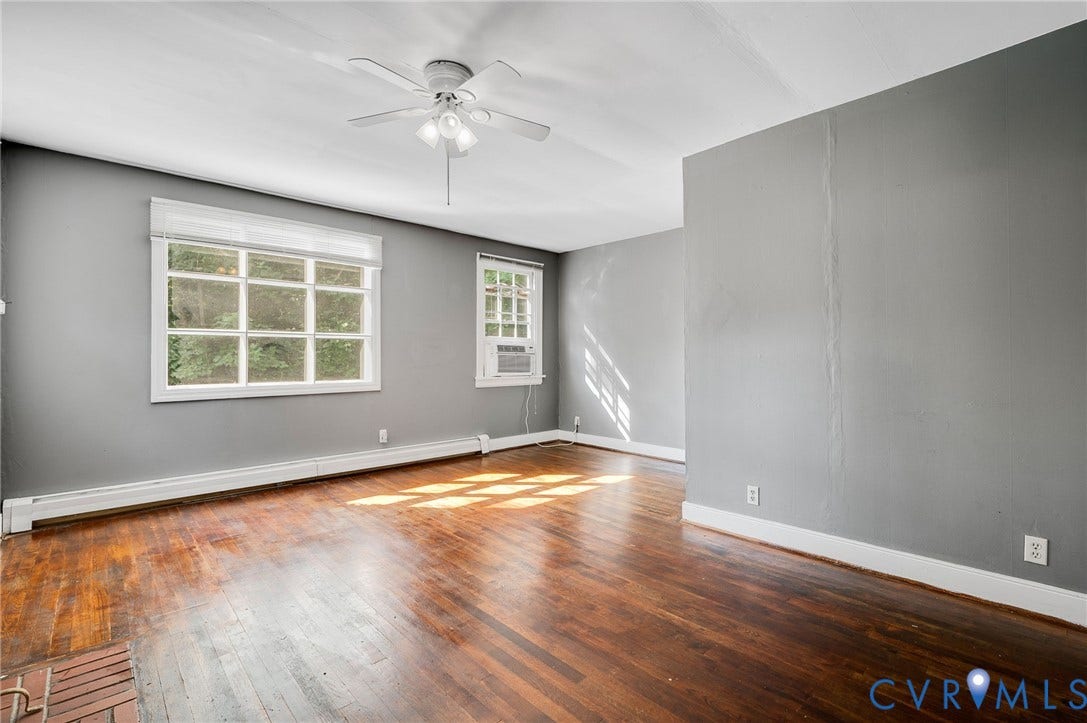 7107 Old Westham Road, Stratford Hills, Richmond, VA 23225 Hardwood flooring, painted walls, ceiling fan, and multiple windows