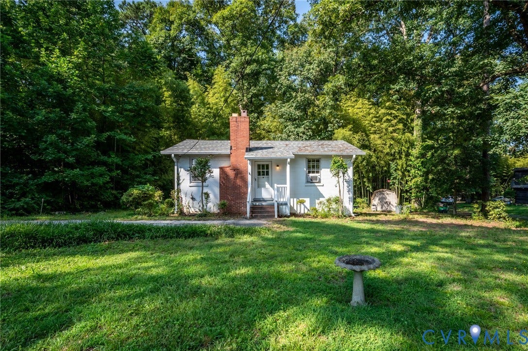 7107 Old Westham Road, Stratford Hills, Richmond, VA 23225 White exterior with a brick chimney and front steps