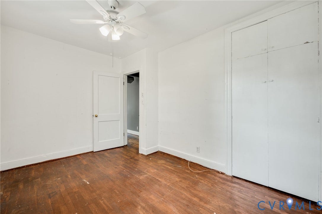 7107 Old Westham Road, Stratford Hills, Richmond, VA 23225 Hardwood-finish flooring, built-in closet storage, ceiling fan light fixture, and white painted walls