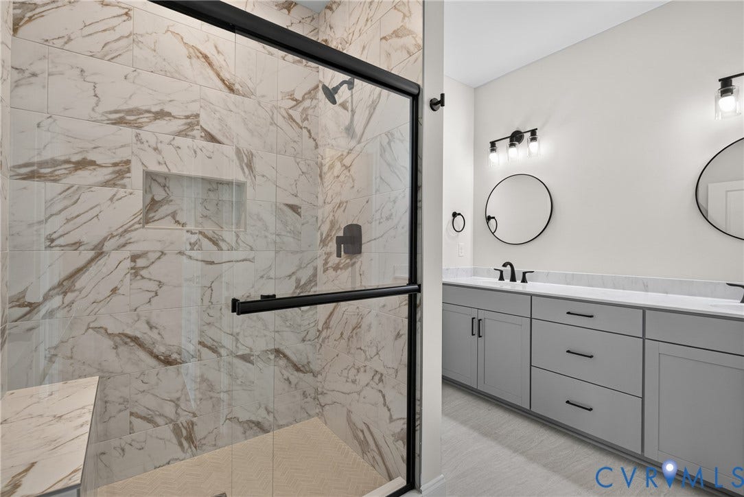 6541 Hardee Haven Place, Midlothian, VA 23112 Walk-in shower with natural stone-look tile, built-in niche, and bench seating