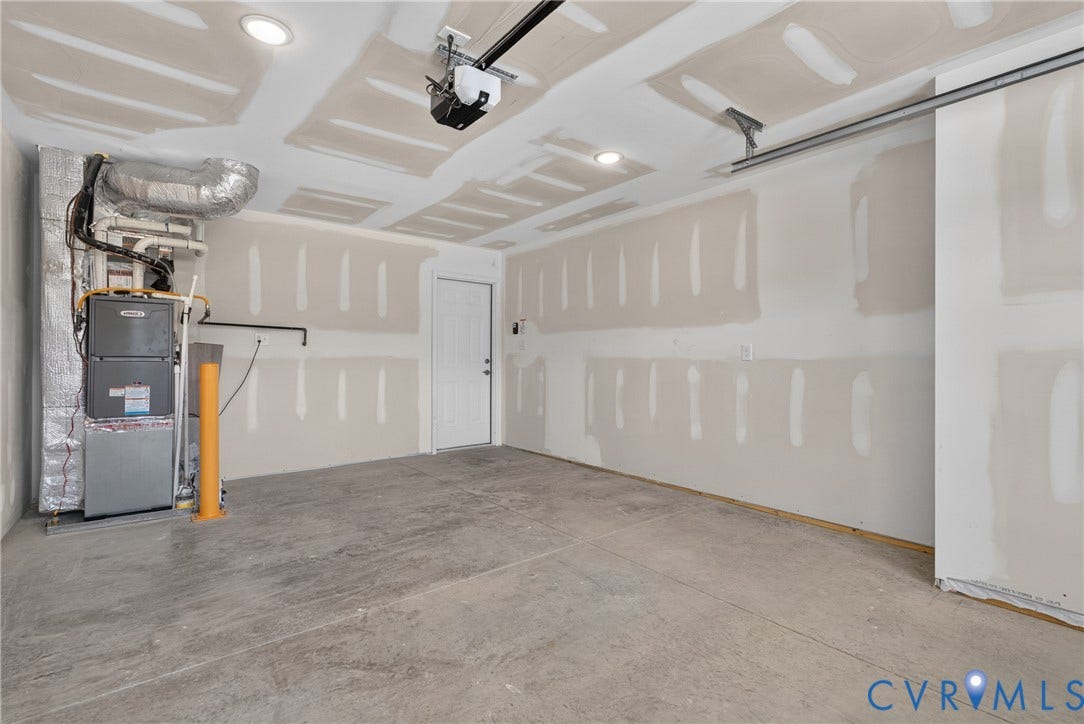 6541 Hardee Haven Place, Midlothian, VA 23112 Concrete flooring, recessed lighting, white door, exposed HVAC system, garage door opener
