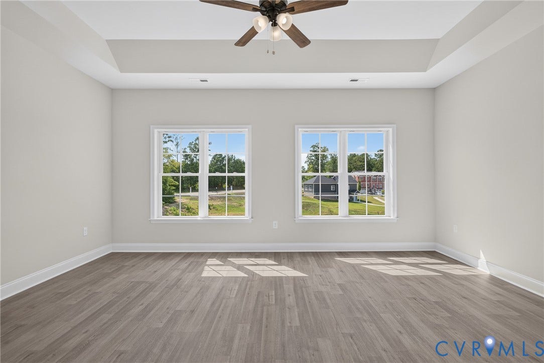 6541 Hardee Haven Place, Midlothian, VA 23112 Tray ceiling, wood-finish flooring, ceiling fan, and two large windows