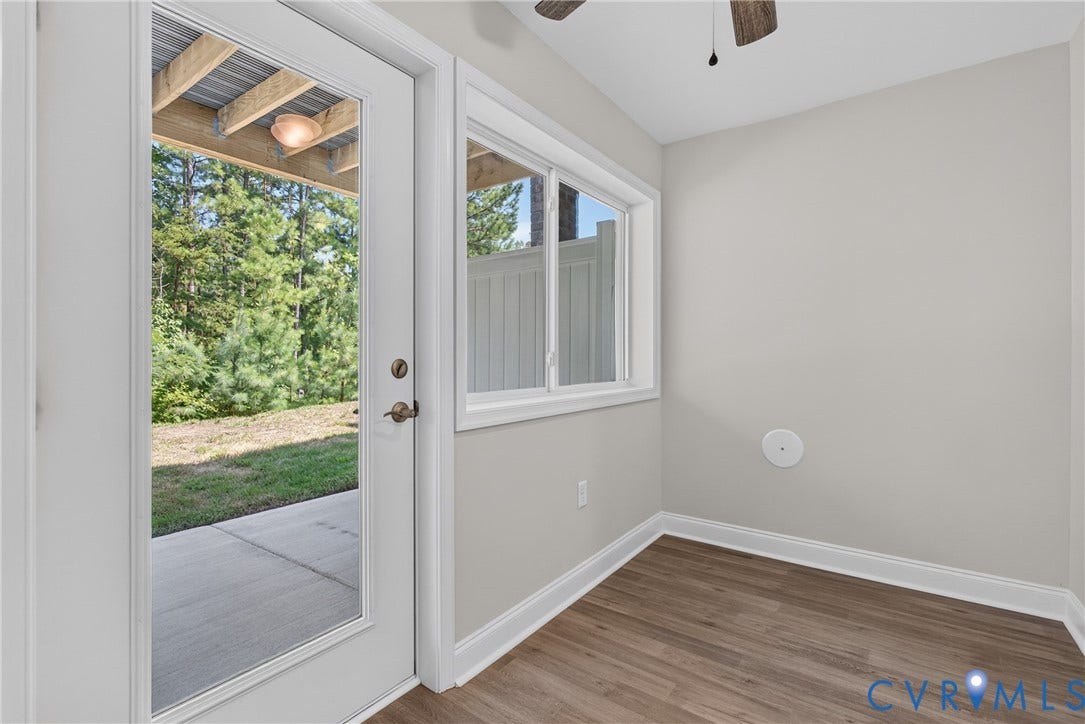 6541 Hardee Haven Place, Midlothian, VA 23112 Full-light exterior door with clear glass, wood-finish flooring, and a ceiling fan