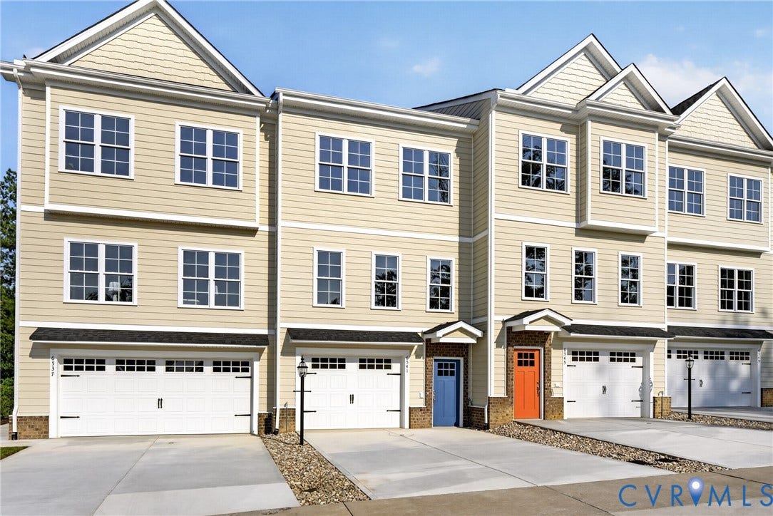 6541 Hardee Haven Place, Midlothian, VA 23112 Three-story townhome with light-toned siding and multiple windows