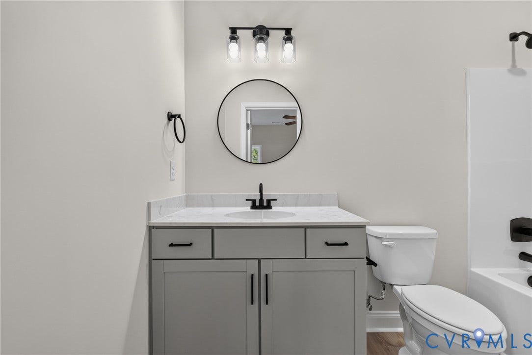6541 Hardee Haven Place, Midlothian, VA 23112 Vanity with gray cabinetry, white countertop, and integrated sink