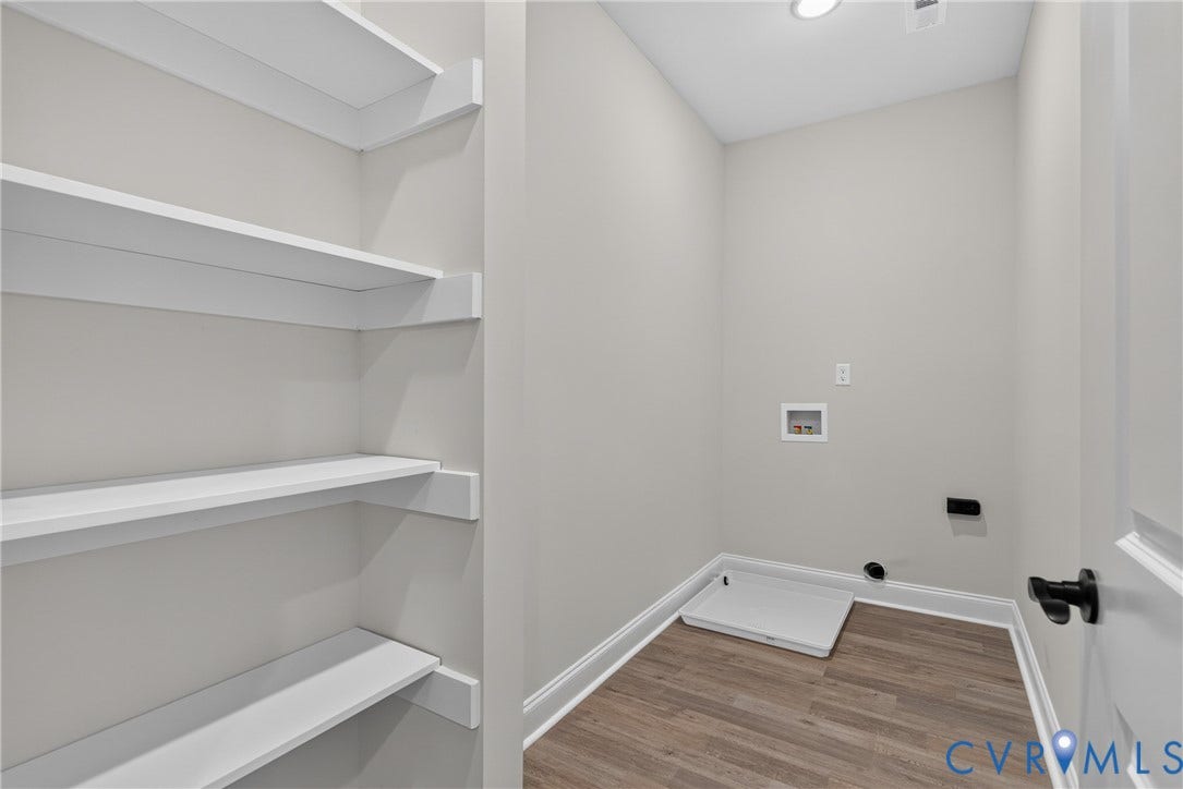 6541 Hardee Haven Place, Midlothian, VA 23112 Room featuring white walls, wood-finish flooring, recessed lighting, and built-in shelving