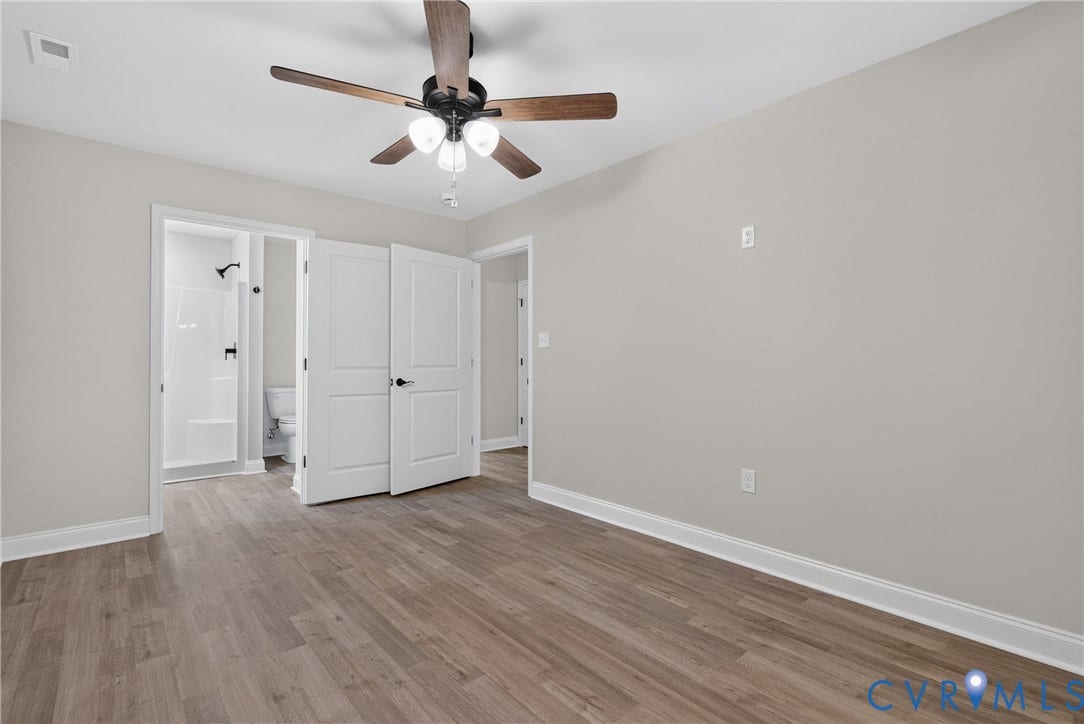 6541 Hardee Haven Place, Midlothian, VA 23112 Wood-finish flooring throughout, light gray wall finishes, and a ceiling fan with integrated lighting