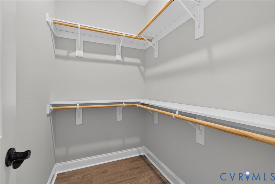 6541 Hardee Haven Place, Midlothian, VA 23112 Built-in shelving and hanging rods with wood-finish flooring and white trim