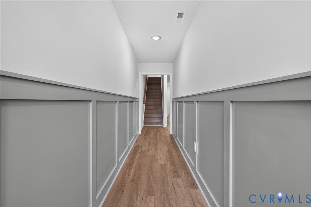 6545 Hardee Haven Place, Midlothian, VA 23112 Hallway featuring wood-finish flooring, two-tone walls with wainscoting, and recessed lighting