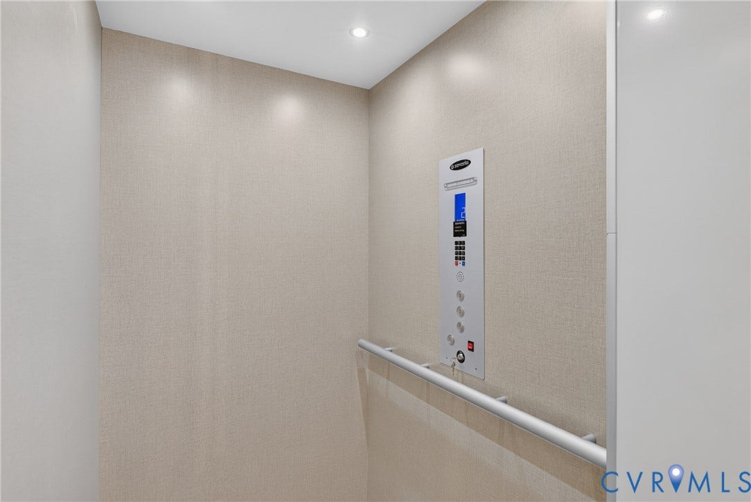 6545 Hardee Haven Place, Midlothian, VA 23112 Integrated elevator featuring light-toned walls, recessed lighting, and a grab bar