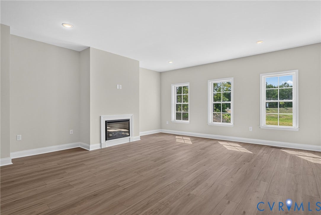 6545 Hardee Haven Place, Midlothian, VA 23112 Recessed lighting, wood-finish flooring, and a built-in fireplace with a white surround