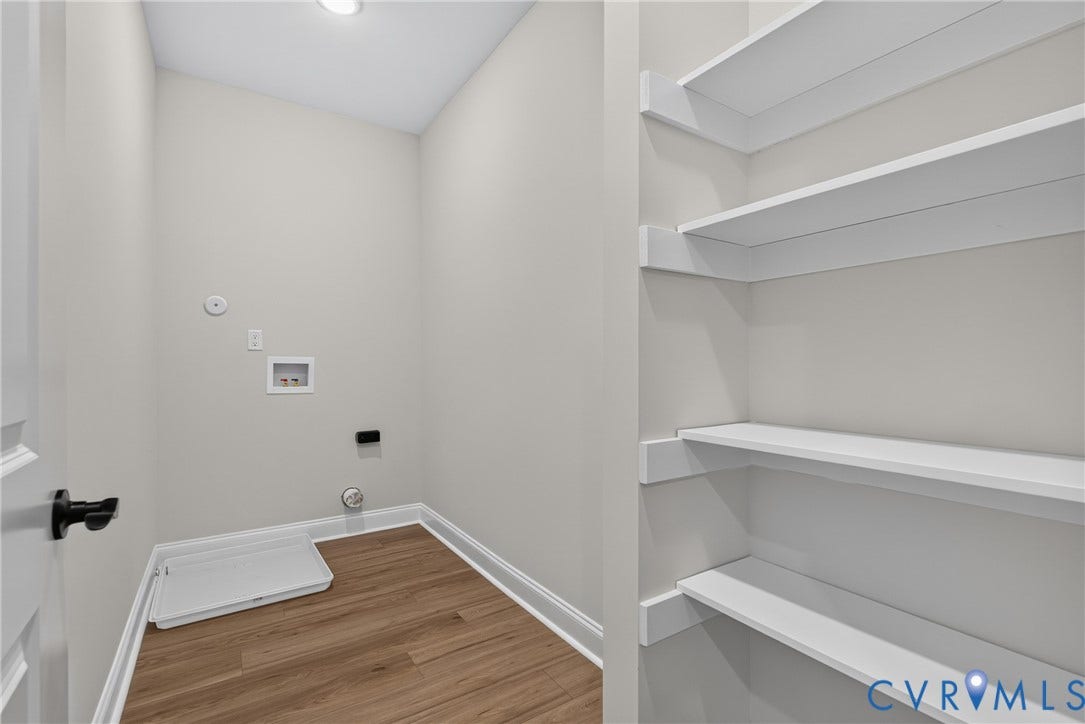 6545 Hardee Haven Place, Midlothian, VA 23112 Laundry area featuring wood-finish flooring, recessed lighting, and built-in shelving