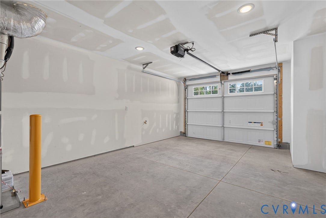 6545 Hardee Haven Place, Midlothian, VA 23112 Concrete flooring, recessed lighting, white panel garage door, automatic garage door opener, and a yellow bollard