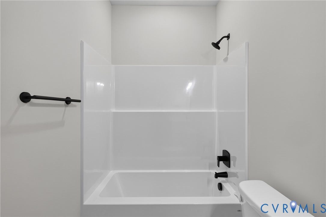 6545 Hardee Haven Place, Midlothian, VA 23112 White acrylic tub and shower combination with matte black fixtures